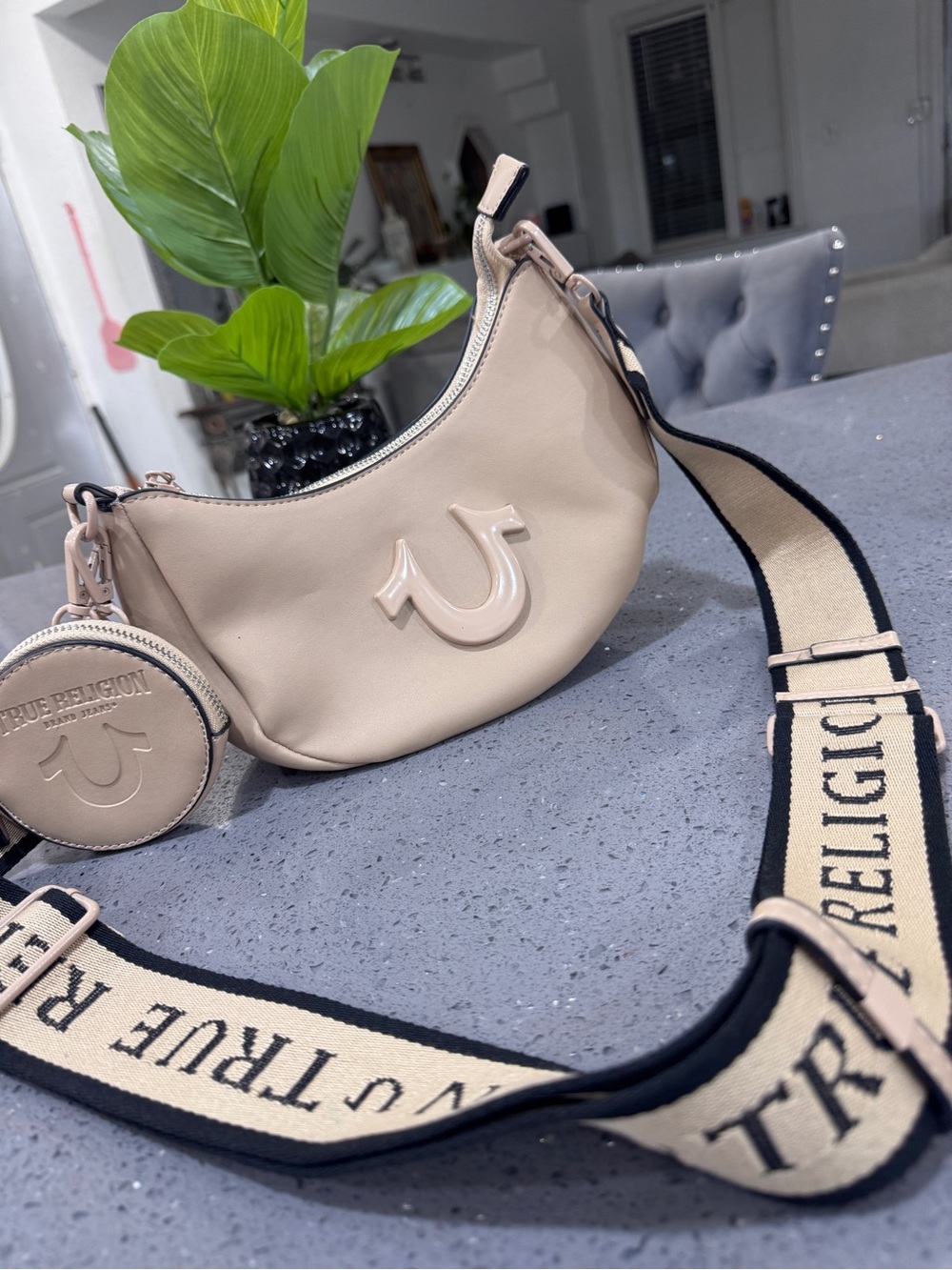 True Religion Light Beige Crescent Shoulder Bag with Branded Strap